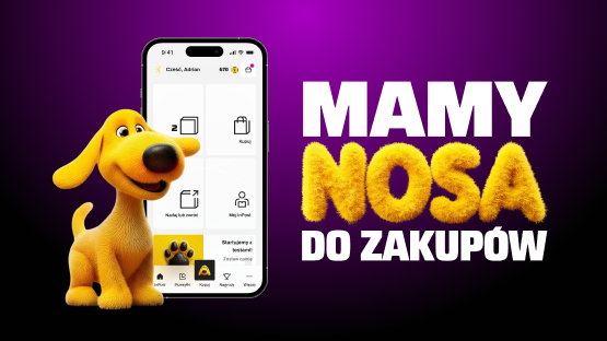 Mamy nosa do zakupów! Uśmiechnięty żółty pies stoi obok ekranu telefonu z włączoną aplikacją InPost